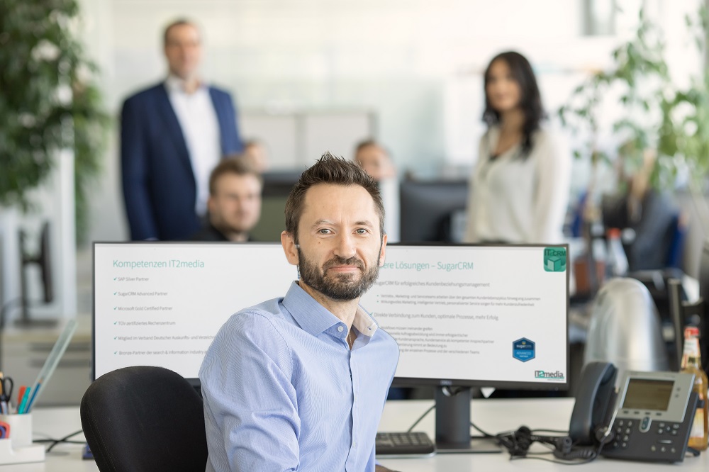 Mitarbeiter im Büro der IT2media