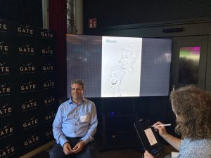 Karikaturist malt Geschäftsführer Mathias Pauli
